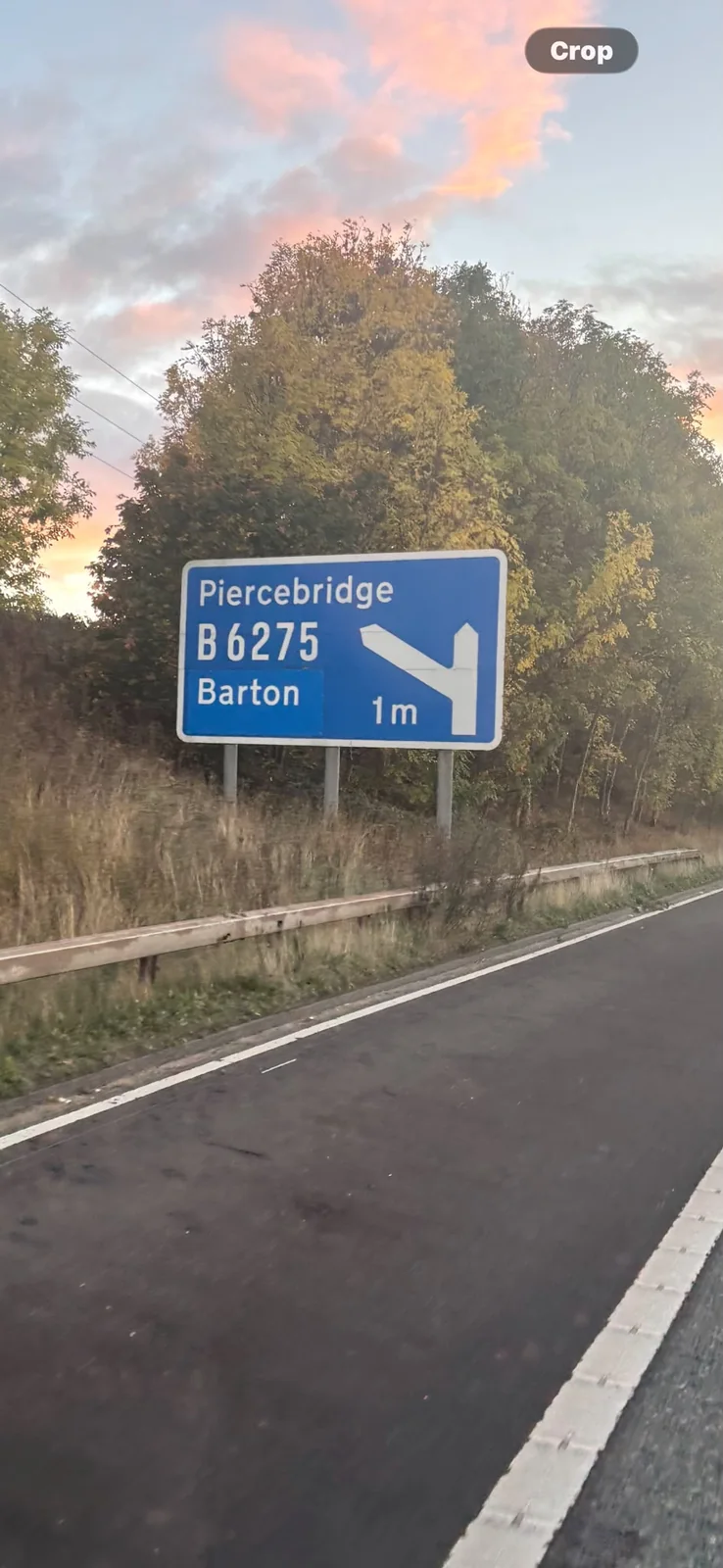 Road sign for Piercebridge B6275 and Barton seen during the Darlington journey